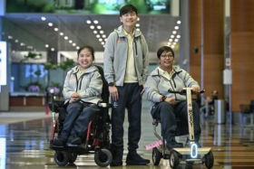 (From left) Boccia athlete Jeralyn Tan, shooter Daniel Chan and archer Nur Syahidah Alim at Changi Airport Terminal 3 on Aug 20, before flying off for the Paralympics. 