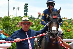 Trainer Daniel Meagher leading in Lim&#039;s Bighorn (Manoel Nunes) after his win in the Class 4 1,200m turf race on March 9. The Australian handler is hoping for a big showing from his galloper in the Class 4 Division 1 1,200m race on Sept 1.
