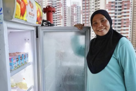 Madam Marlina Yased started a community fridge initiative offering free food for her neighbours in need. 