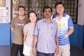 Mr Jayaprabha and his peers at Queenstown Hock San Zone Residents' Committee Centre.