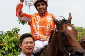 Two-time Singapore champion trainer Jason Ong with Pacific Vampire (Bruno Queiroz) at one of his four wins. A test over 1,400m on Sept 21 will serve as a gauge to a daring Singapore Gold Cup (2,000m) gamble on Oct 5.
