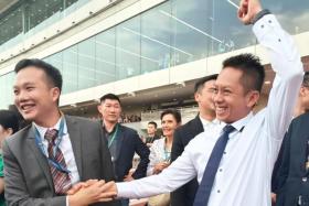 An exuberant David Kok getting congratulated by well-wishers after his horse Smart Star won the Singapore Gold Cup on Oct 5. It was the last time a trainer would receive any form of ovation at Kranji with horse racing ending after the race.
