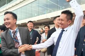 An exuberant David Kok getting congratulated by well-wishers after his horse Smart Star won the Singapore Gold Cup on Oct 5. It was the last time a trainer would receive any form of ovation at Kranji with horse racing ending after the race.