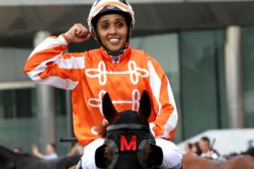 An elated Bruno Queiroz bringing his fourth winner Pacific Padrino back to scales after winning the penultimate race in Singapore, which tied him with Manoel Nunes on 58 wins. The Singapore Gold Cup was the decider but, with both not winning, the jockeys&#039; title went to Queiroz on a countback for seconds.
