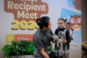 A delighted Mr Lim Wee Kiat meeting his bone marrow recipient, Ho Wen Qing, for the first time on Sept 21. 