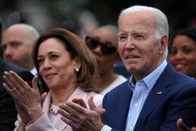 US President Joe Biden claps next to US Vice-President Kamala Harris while hosting a Juneteenth concert on June 10. 