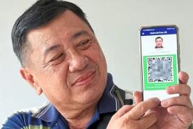 The mobile interface of the MyBorderPass app which allows for facial recognition and QR code clearance at the Johor land checkpoints.