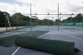 The tennis courts, some of which have had their nets and fences taken down, at The Cage Sports Park on Dec 21.