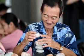 Mr Foo Hwee Wan, 77, has discovered his hidden talent in stone stacking since he met the students.