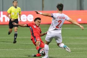 Singapore midfielder Hami Syahin (left) believes the Lions can turn around a 2-0 deficit against Vietnam in the Asean Cup semi-finals.