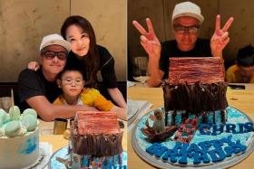 Local celebrity couple Christopher Lee (left) and Fann Wong celebrate Lee&#039;s 53rd birthday with their son Zed.