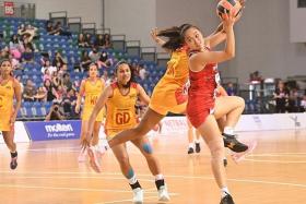 Singapore co-captain Toh Kai Wei (with ball) is confident her team will be able to perform well against Papua New Guinea in the final on Oct 28.