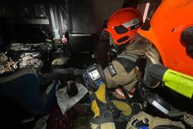 SCDF said the living room of a unit on the first storey was on fire when they arrived.