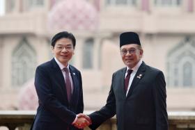 PM Lawrence Wong with Malaysian PM Anwar Ibrahim at Perdana Putra during the Leaders&#039; Retreat on Jan 7.