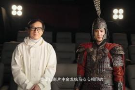 Hong Kong star Jackie Chan (left) next to a de-aged version of himself in a promotional clip for the movie A Legend.