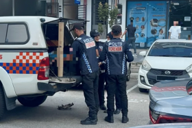 The victim and his friends were having lunch in front of a restaurant before he was shot.