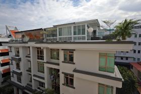 ST reported in September that BCA and URA said they were looking into possible unauthorised rooftop structures constructed at Rose Maison (above) and EiS Residences.