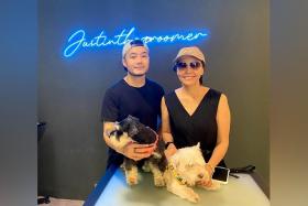 Mr Justin Tan, who runs pet grooming shop Justin The Groomer, with one of his celebrity clients, actress Zoe Tay.