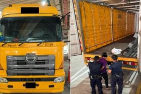 ICA officers found a man hiding inside the cargo compartment of the lorry without any travel documents.