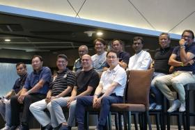 (Front row, from left) 1994 M-League and Malaysia Cup double-winning team's Zakaria Awang, David Lee, Ishamudin Bharoocha, Abbas Saad, Jang Jung, (back row, from left) Malek Awab, Nazri Nasir, Rezal Hassan, T. Ramoo, Saswadimata Dasuki, and Rafi Ali watching a highlight reel of the 1994 campaign during the 30th anniversary event at at Singapore Sports Hub's OCBC Lounge on Dec 17.