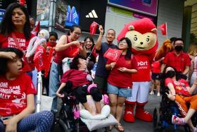 Supporters cheering during the celebratory parade in Orchard Road on Sept 14.