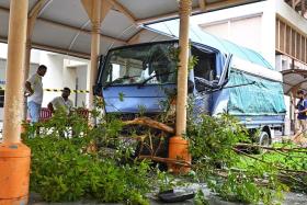 A resident said the lorry had hit a small tree before knocking into the pillars of a sheltered walkway at Block 854 Tampines Street 82 on Jan 14.