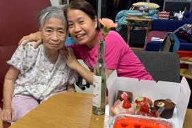 Ms Serene Low (right), seen here with with her mother Madam Chow Fong Kheng, found support for caregivers like herself through Care Corner Singapore.