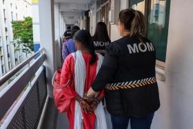 13 migrant domestic workers allegedly worked as illegal household cleaners for other employers without valid work passes for the job.