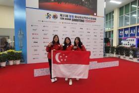 (From left) Singapore shooters Fernel Tan, Martina Veloso and Natanya Tan won a silver medal in the 10m air rifle women&#039;s team event.