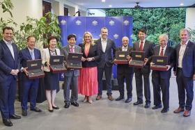 (From left) Australian Minister Stuart Ayres, former UOB managing director Bill Chua, former HDB chief executive Cheong Koon Hean, SPH Media Trust chairman Khaw Boon Wan, Newcastle Lord Mayor Nuatali Nelmes, Port Stephens mayor Ryan Palmer, Singapore High Commissioner to Rwanda Jaspal Singh, former Ministry of Information, Communications and the Arts permanent secretary Tan Chin Nam, former Singapore Food Industries chief executive Peter Tay Buan Huat and Australian High Commissioner to Singapore Will Hodgman at the Australian High Commissioner's Residence on July 25, 2022.