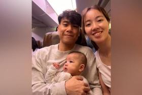 Singaporean fencers Samson Lee (left) and Cheryl Lim with their son Steffan on the flight to Milan.