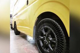 A Michelin puncture proof tyre fitted on a DHL Express van.