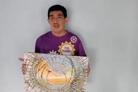 Mr Nigel Choo with an artwork he created at the Touch Centre for Independent Living.