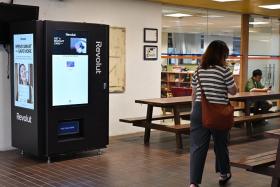 The vending machine is located next to the NUS Business Analytics Centre, and is the first of its kind in Singapore.  