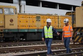 LTA&#039;s deputy director for trackwork Zailani Mohamed Idris (left) and SMRT senior engineer Shazni Jaffar were among the more than 800 workers mobilised to carry out repairs.